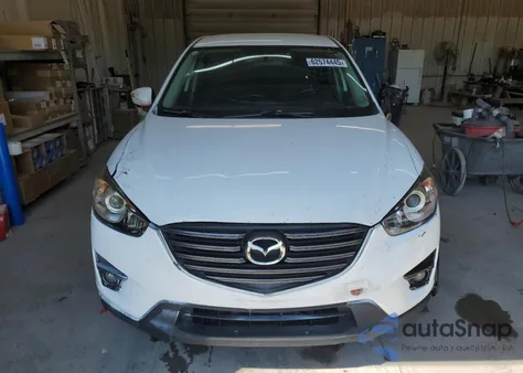 2016 Mazda Cx-5 Touring from USA, damaged, VIN JM3KE2CYXG0915124